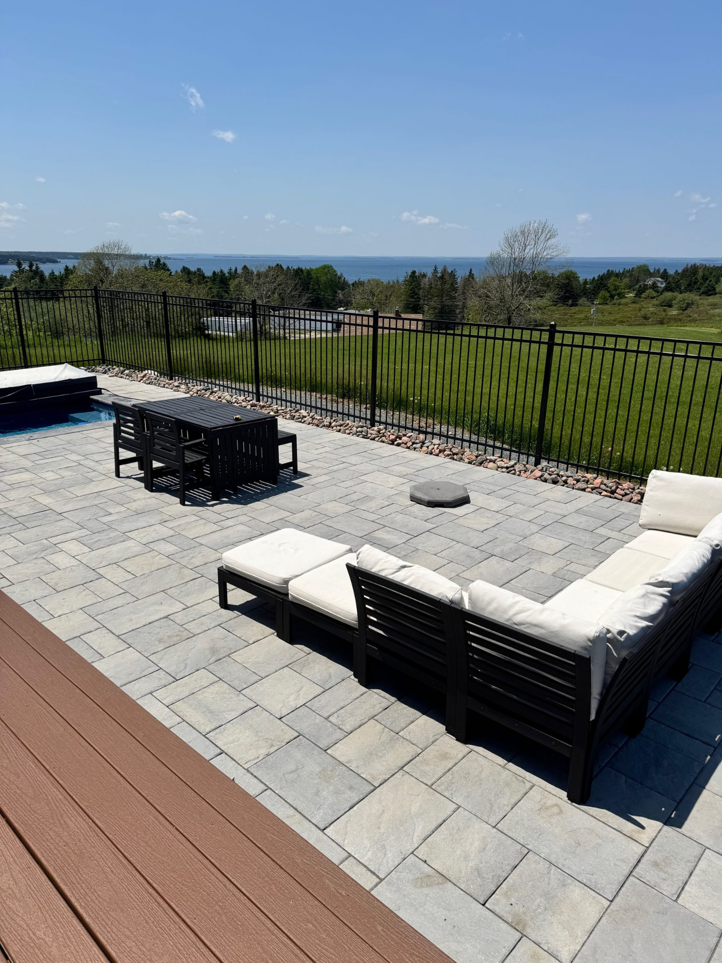 Patio lounge with outdoor seating beside the house